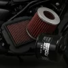 Filtros KN para moto com motor ao fundo